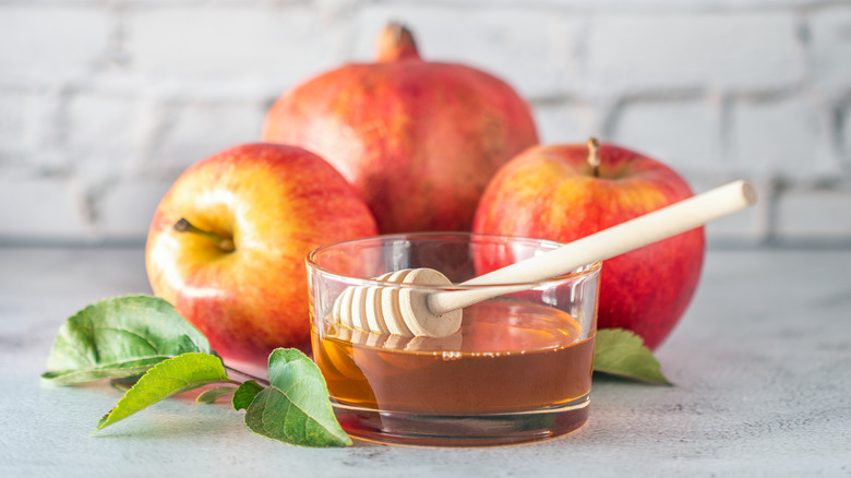 honey and apples on counter