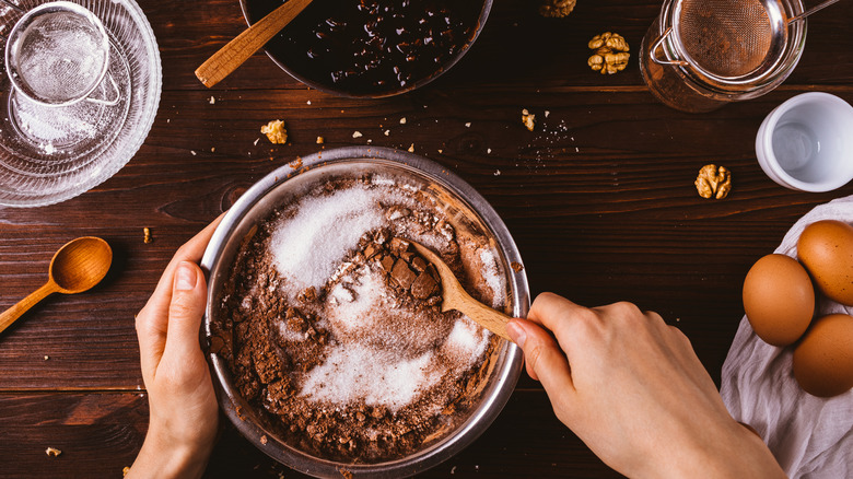 Woman making brownies at home