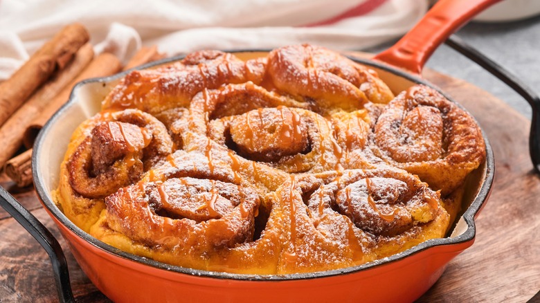 Caramel cinnamon rolls in cast iron pan