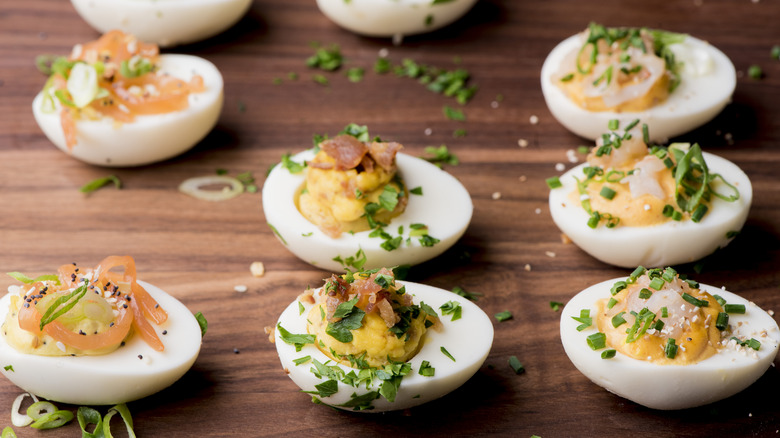 Deviled eggs with various toppings