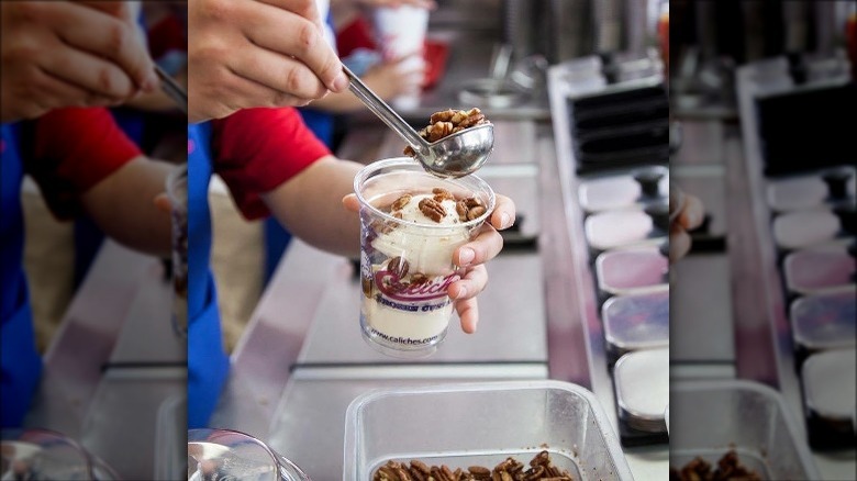 Caliche's green chile sundae topped with nuts