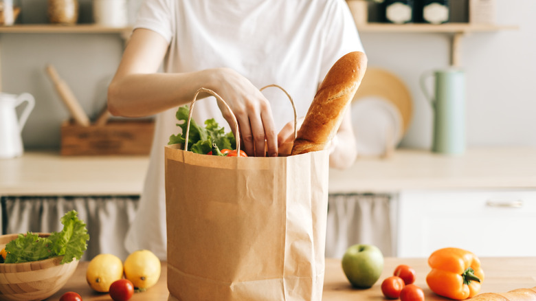 Woman unpacking groceries