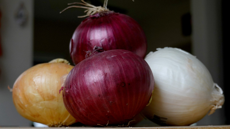 Yellow, red, and white onions