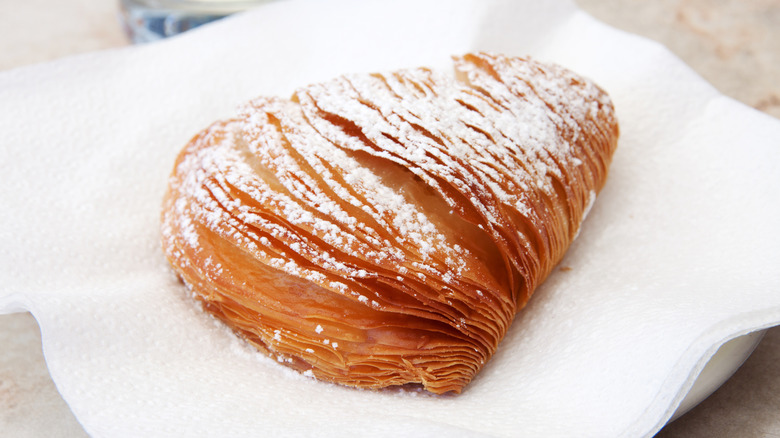 Sfogliatella pastry on napkin