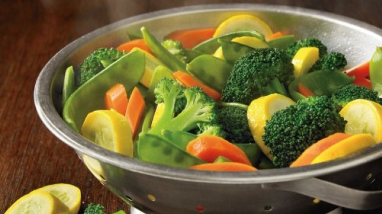 Fresh mixed veggies in colander