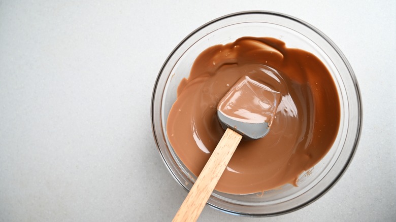 melted chocolate in glass bowl