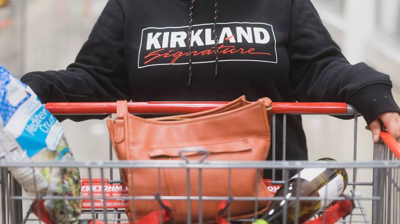 Costco shopper with kirkland hoodie