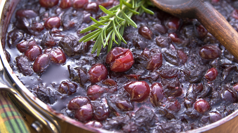 pot of cranberry sauce with rosemary