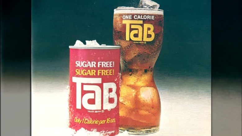 TaB advertising with glass and can