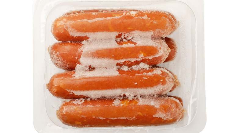 frozen hot dogs in plastic wrap