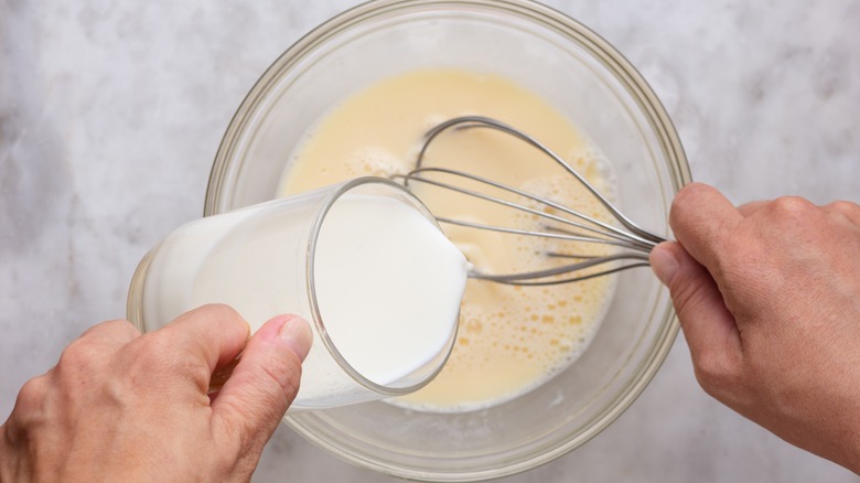 milk whisked into a batter