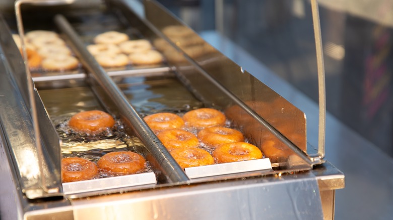 Mini donuts in frying machine