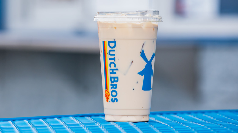 Dutch Bros iced coffee in a clear cup