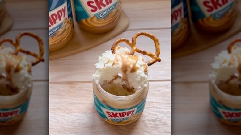 a picture of homemade peanut butter jar ice cream with pretzels