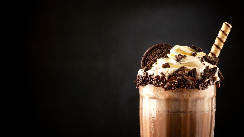 Chocolate milkshake with cookies and sprinkles