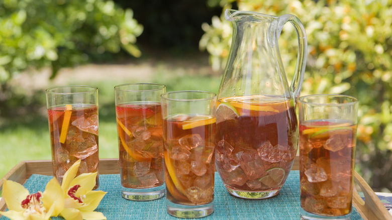 Pitcher of iced tea and glasses on tray