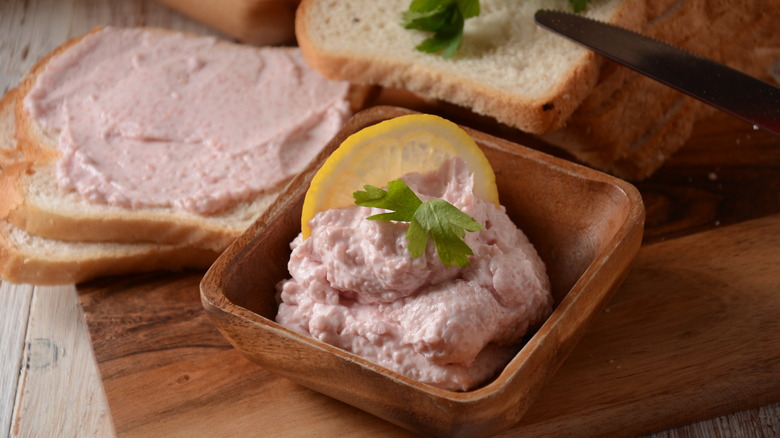 bowl of swedish creamed cod roe garnished with herb