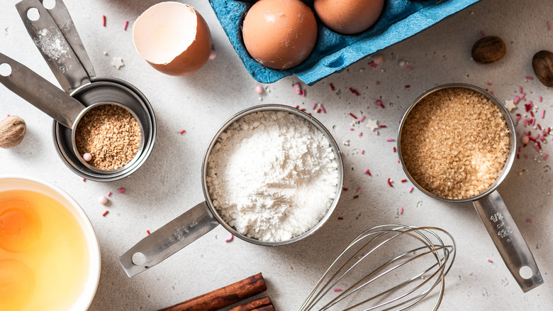 baking ingredients arranged on a white background