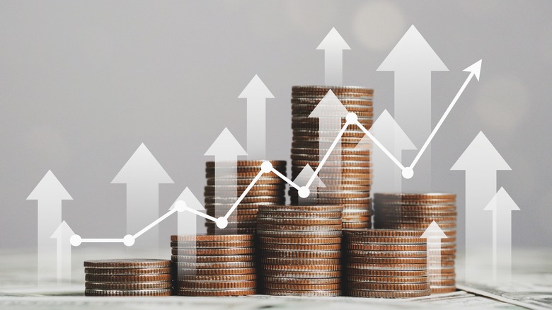 stacks of coins, profit chart