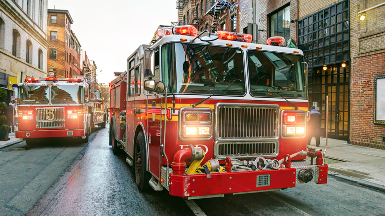 Two fire trucks in the street