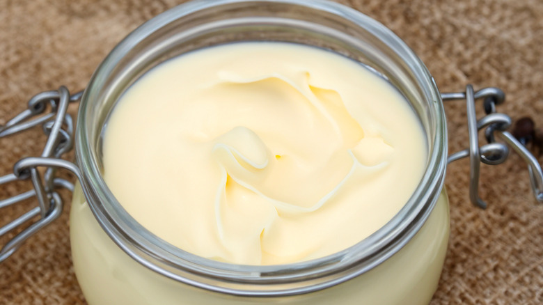 A close-up of a jar full of beef tallow