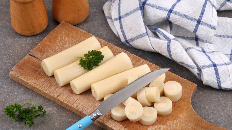 Palm hearts on cutting board