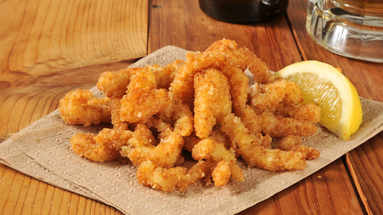 deep-fried clam strips with lemon