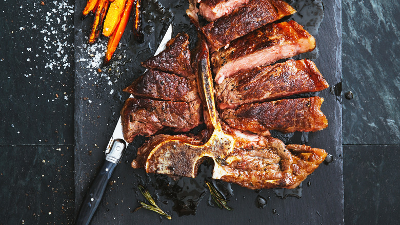 Grilled T-bone framed by salt 