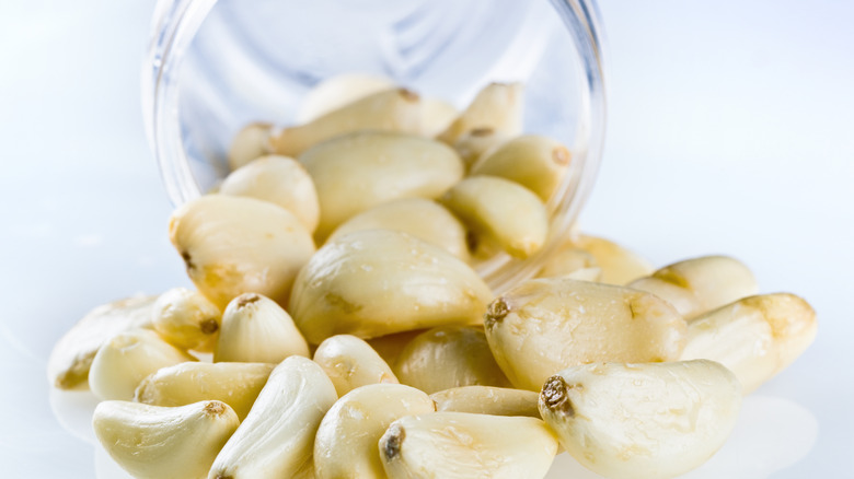 Peeled garlic in a jar