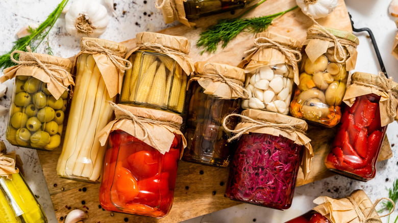 Various pickled vegetables in jars