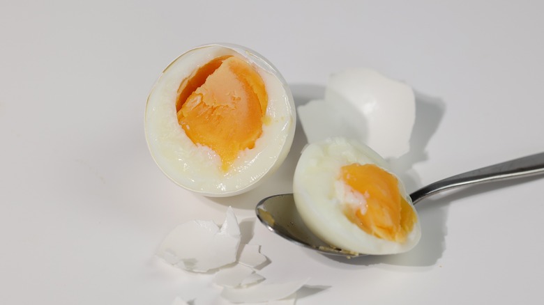 Hardboiled eggs with spoon