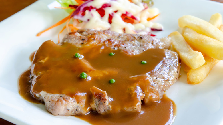 Pork chop with brown gravy