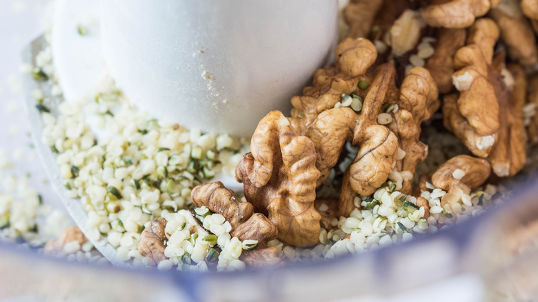 walnuts being blended in food processor