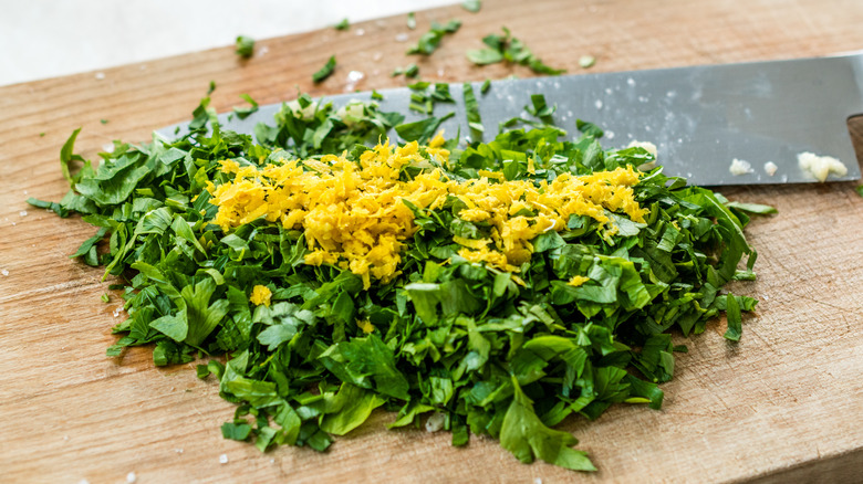 chopped gremolata on cutting board