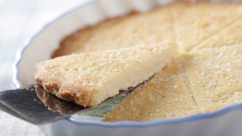 shortbread being lifted out of pan