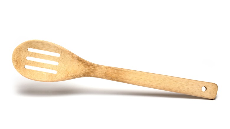 A bamboo slotted spoon