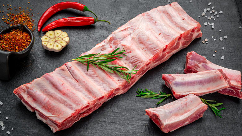 Rack of ribs on black background