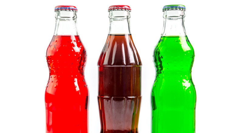 bottles of soda in different colors