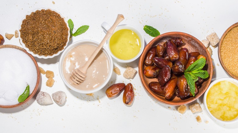 bowls of honey, agave, date sugar, and steva