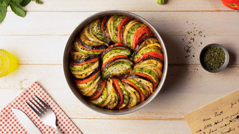 layered ratitouille in a pan