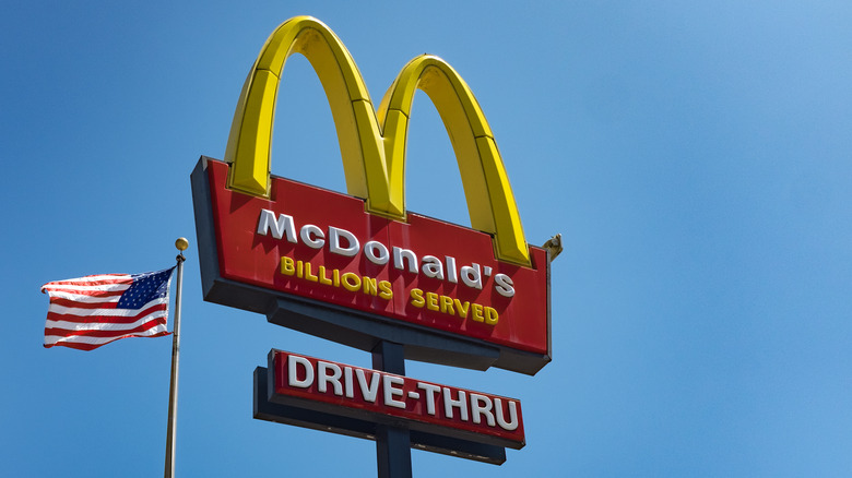 A McDonald's sign against a blue background