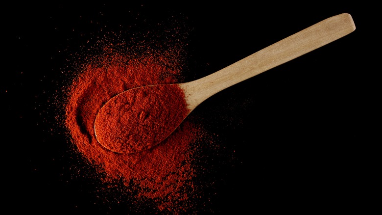 paprika in wooden spoon