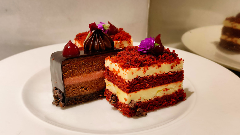 pieces of chocolate and red velvet cakes