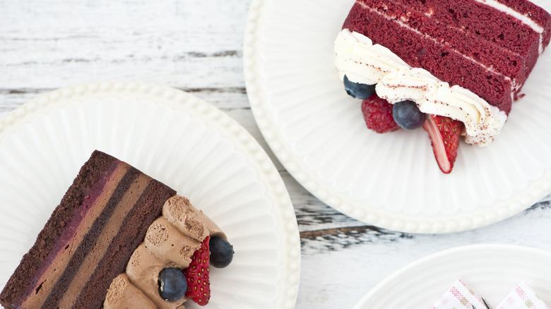 slices of chocolate and red velvet cakes