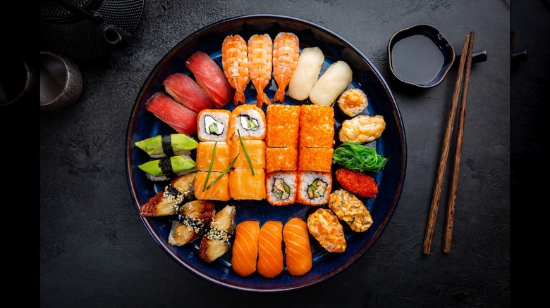 various sushi displayed on plate 