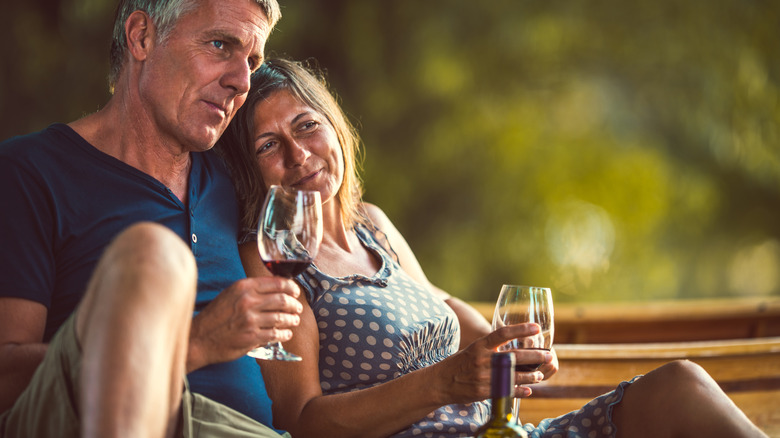 couple drinking wine outside