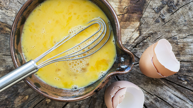 Whisked eggs in a pot 