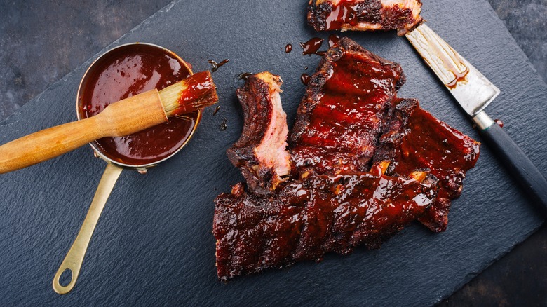 Ribs with marinade on slate