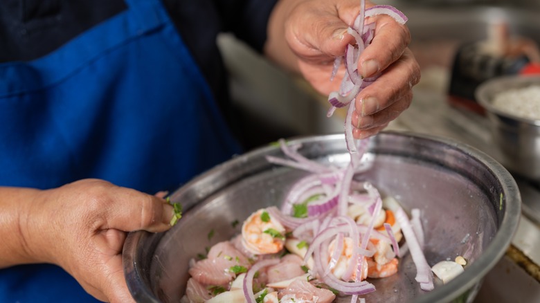 mixing ceviche