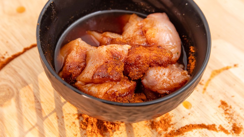 Tandoori chicken marinating in a spices and lemon juice